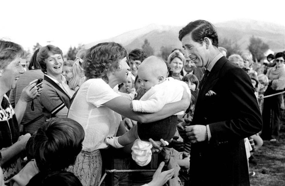 Mrs Sheelagh Wood, of Twizel, holds 5-month-old Matthew in front of a smiling Prince Charles.