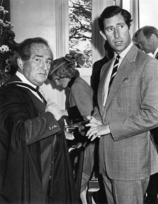 Prince Charles talks to Otago Boys' High School rector Donald MacLachlan. In the background, the...