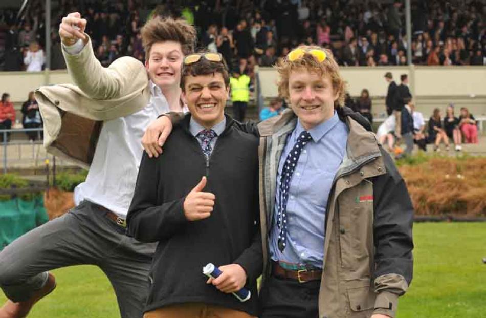 Enjoying their day are (from left) Tim Crampton, of Dunedin, Henry Ryan, of Mossburn, and Nick...