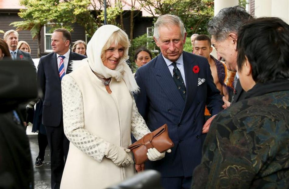 The Duchess of Cornwall and the Prince of Wales during a welcome ceremony at Government House in...