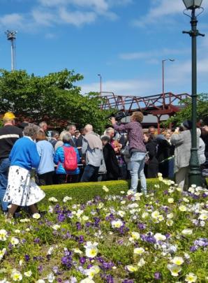 Flower beds took some punishment as people surged to get close to the action. Photo Craig Borley