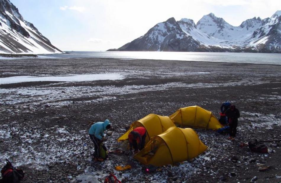 Breaking camp at Fortuna Bay,  day three.