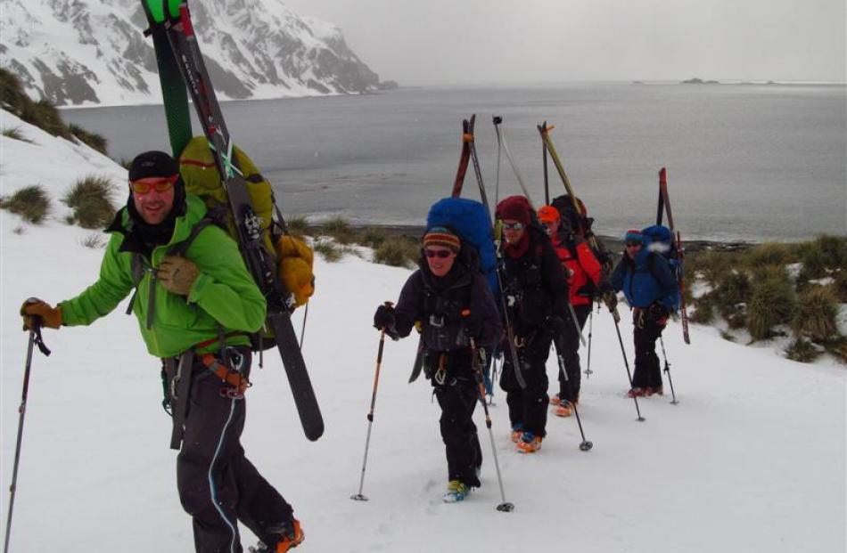 The group, led by Tom MacTavish, hiking above Fortuna Bay on day three.