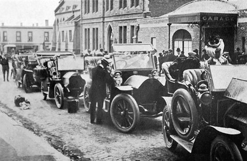 Cars competing in the Christchurch-Dunedin-Christchurch reliability run leave Cooke Howlison's...