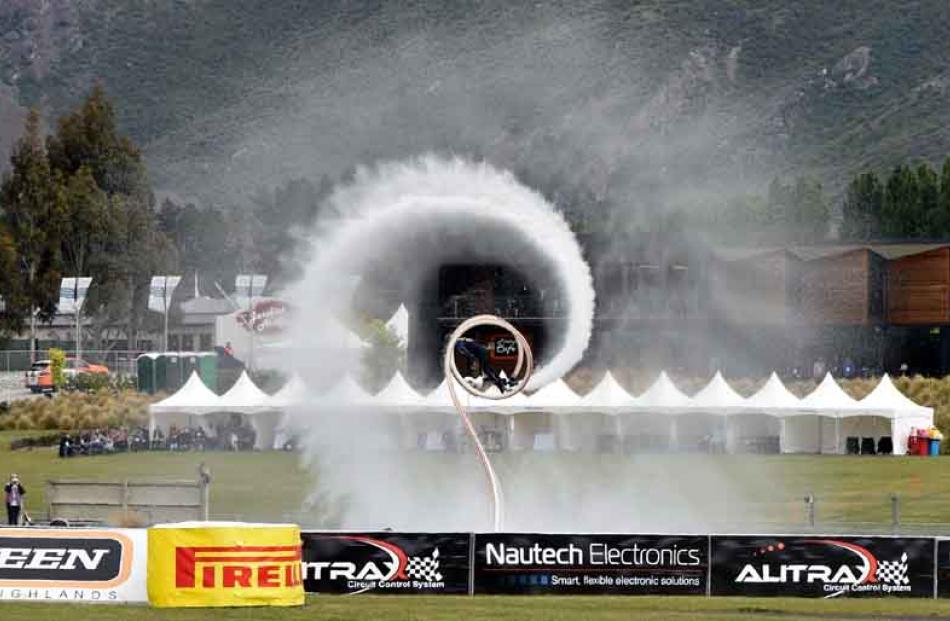 Beau Weston of Flyboard Queenstown performs for the crowd during the lunchtime break in racing,...