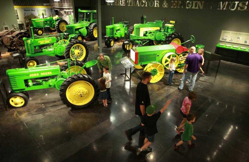 Visitors walk around the John Deere tractor and engine museum in Iowa. PHOTO: JOHN DEERE TRACTOR...