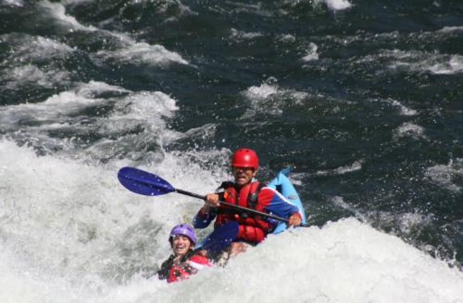 Visitors enjoy whitewater action on the South Fork American River in El Dorado, California. PHOTO...
