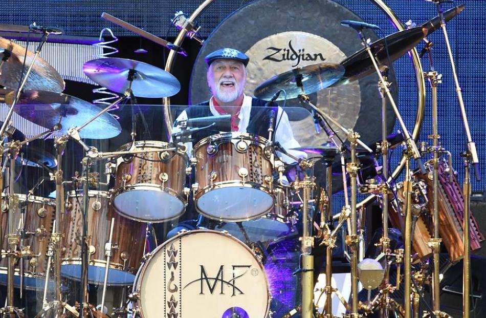 Fleetwood Mac drummer Mick Fleetwood lets out a grin at last night's concert at Forsyth Barr...