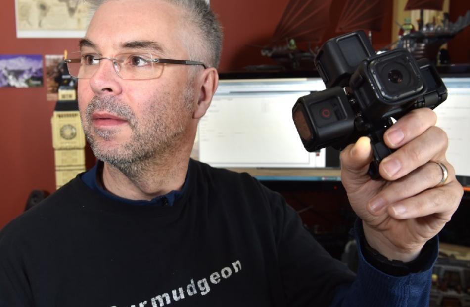 ARL software developer Craig McNaughton holds a 360 degree camera.