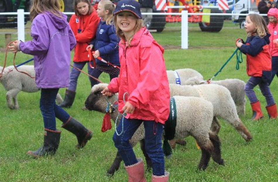 Sienna Hawke, of Waimate, is all smiles walking her Supreme Champion pet lamb 8-week-old Cocoa....