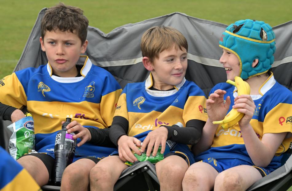 Enjoying some downtime are Taieri year 6 players (from left): Quest Wyllie-Strachan, Hunter...