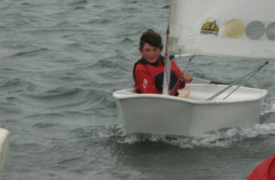 Blair Sutherland sails on Otago Harbour during a Green Island School camp.