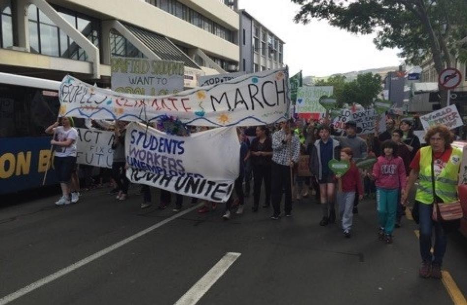 Protesters march down George St. Photo by Rhys Chamberlain.
