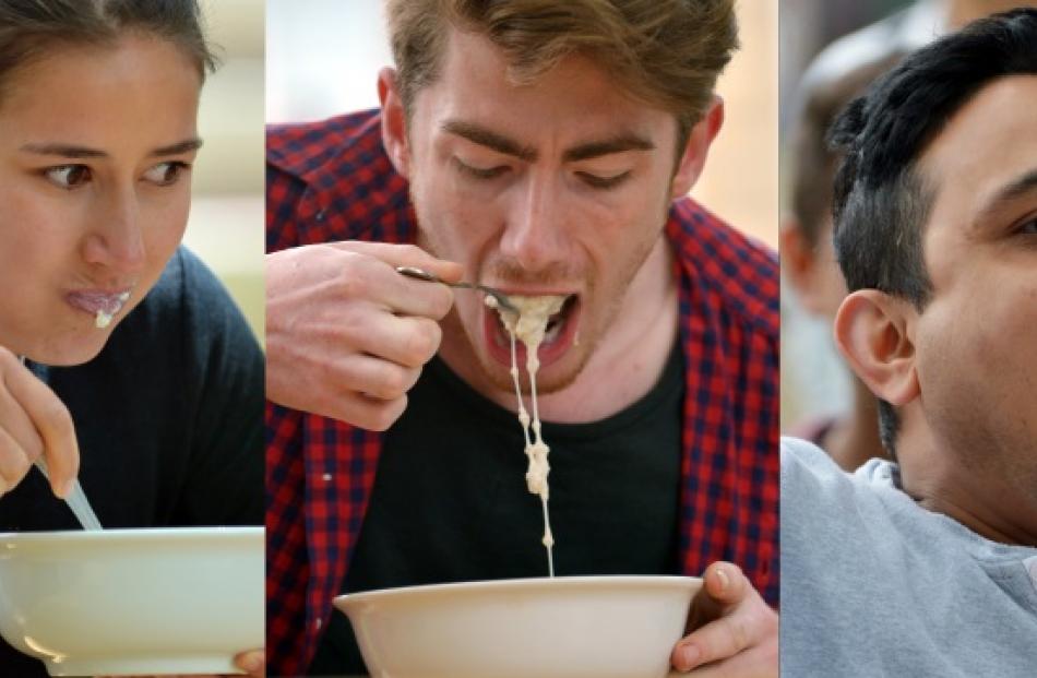 Competing for a porridge-eating ''world record''  are (from left)  Daisy Power (25), Jacob Brazil...