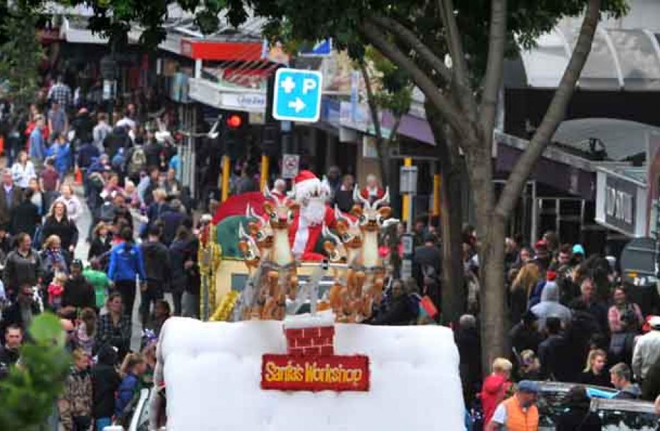 Santa Claus makes an early visit to Dunedin for yesterday's Santa Parade. Photo by Christine O...