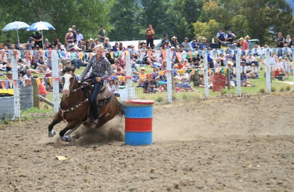 Annabelle Wiggins competes in the open barrel event.