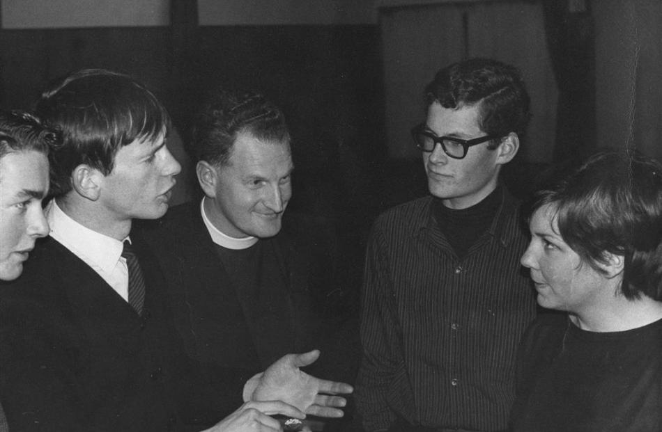 The Rev Ewing Stevens engages with young people at the Wakari Presbyterian Church in the 1960s.