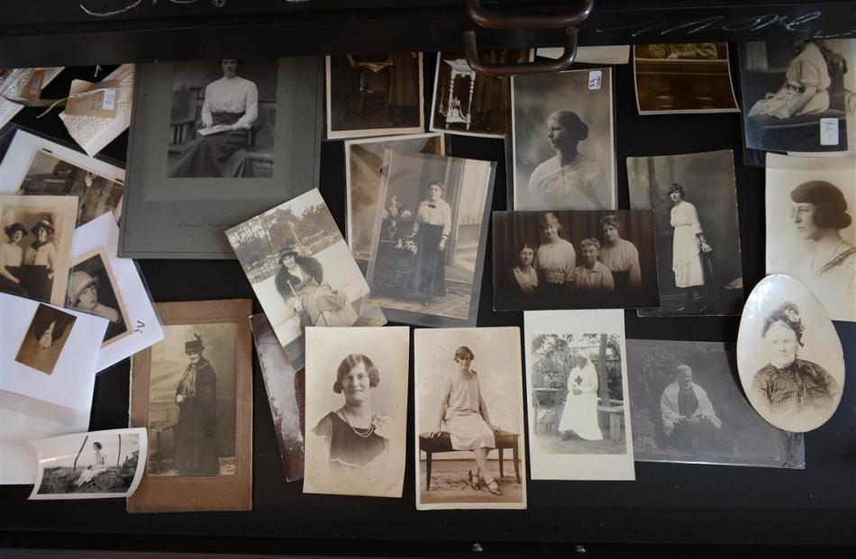 Her ‘‘spinster’’ drawer of vintage photographs of women.