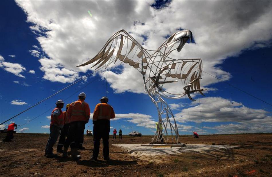 Mark Hill's Haast Eagle sculpture is placed on its base at Macraes. Photo by Craig Baxter.