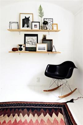 A replica Eames chair fits in with the clean, simple decor.