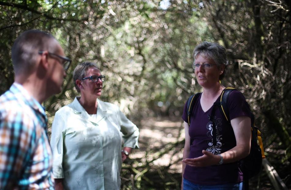 Hiltrun Ratz explains the plight of the yellow-eyed penguin to Dunedin North MP David Clark and...