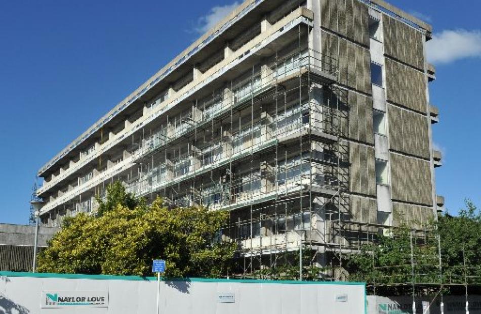 Work progresses on removing balustrades and balconies from the University of Otago’s arts...