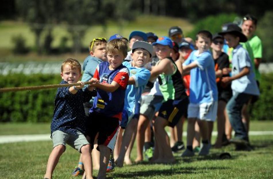 Tug-of-war at the  races. The boys beat the girls for the first time in five years.