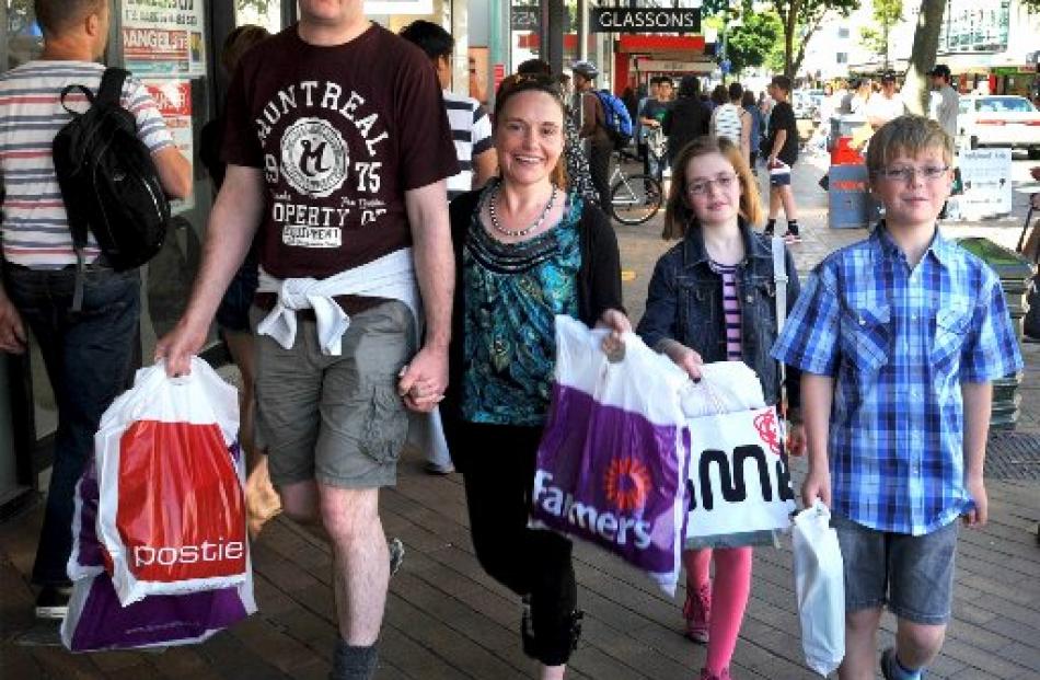 Gabe McGregor (left), his wife Alyssa, daughter Summer (8) and son Tigue (10) joined the crowds...