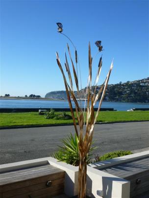 One of Forged and Crafted’s popular raupo sculptures at a home in St Clair, Dunedin.
