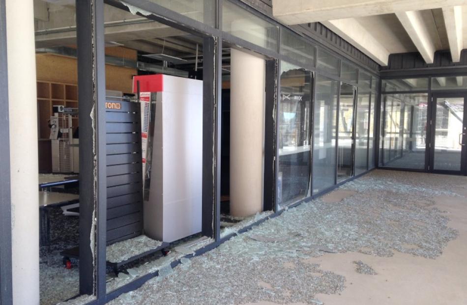 Blown out . . . Smashed windows on the base building's 
ground floor. PHOTO: TRISCH INDER