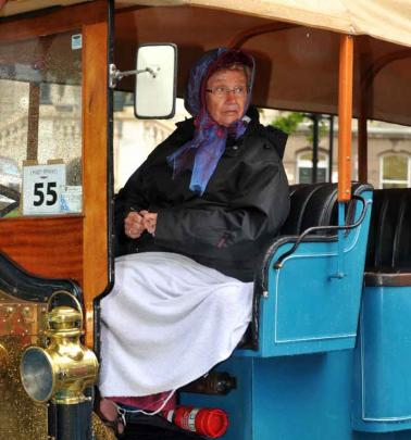 Sharran Price rugs up aboard a 1915 Renault Charabanc.