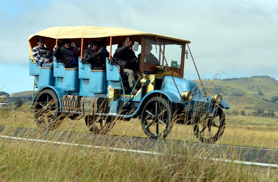 A 1915 Renault Charabanc travels near Karitane yesterday.