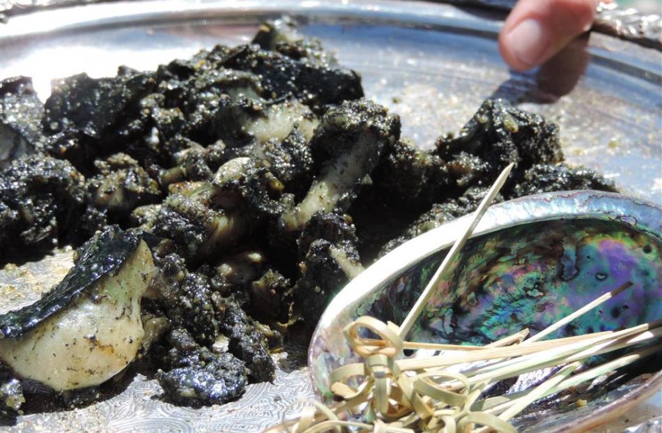 Traditional kai: seared paua seasoned with karengo (native seaweed), native pepper and lime.