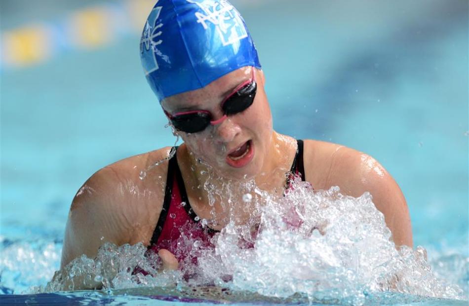 Neptune’s Devon Familton (16) powers to a win in  the women’s 15-16 years 100m breaststroke.