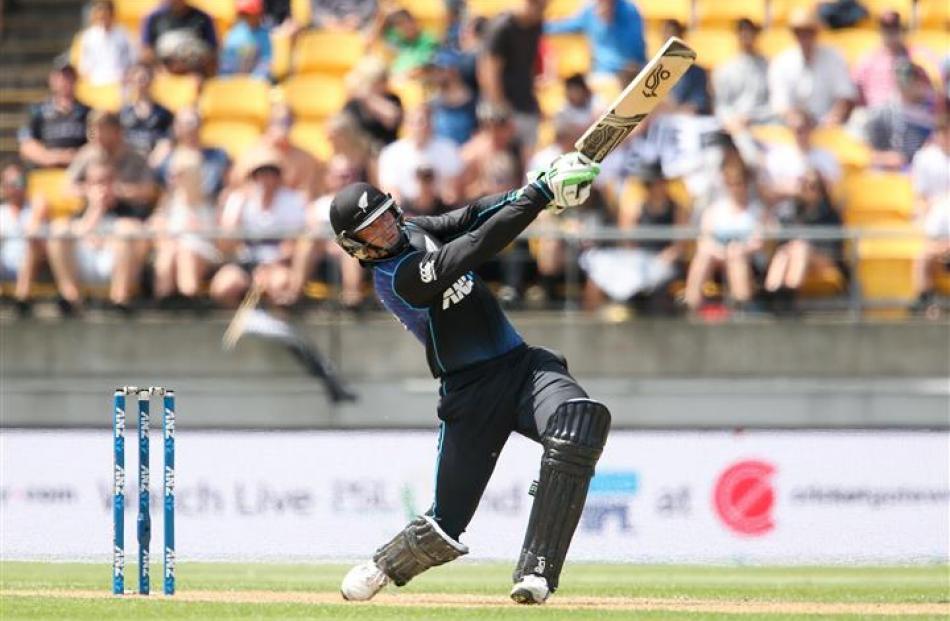 Martin Guptill plays on the front-foot during New Zealand's second ODI against Australia. Photo:...