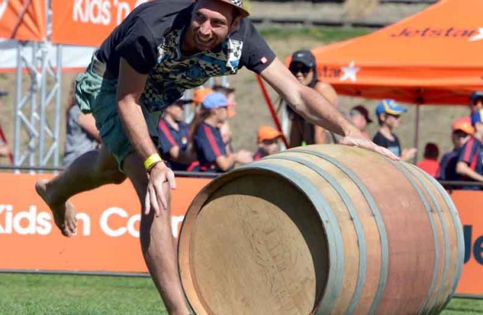 Andy Mafeo, from France, races with a wine barrel.