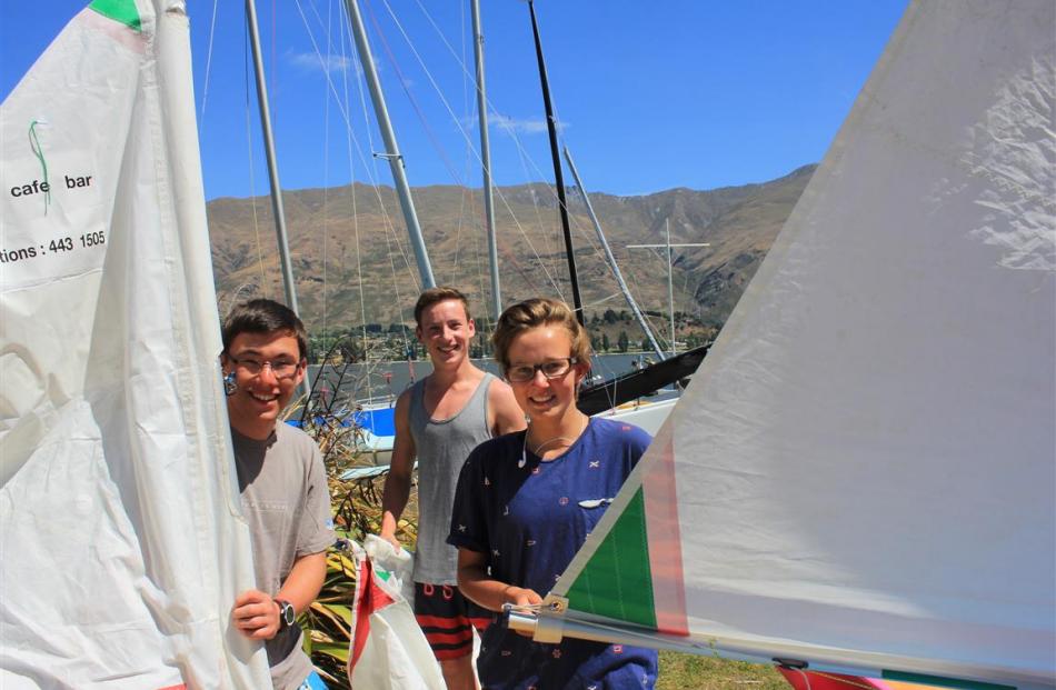 Sean Dickey (left), Luke Burke and Nicola Sanders (all 16), all of Wanaka, prepare to sail.