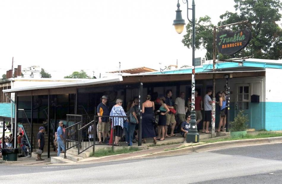 People queue every day for at least two hours for barbecue at Franklin Barbecue in Austin.