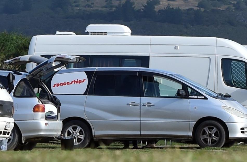 Campers pack up for the night at Warrington Domain's freedom-camping site.