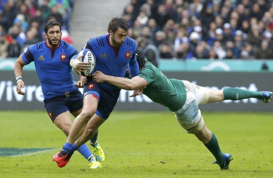 France's Maxime Medard is tackled by Eoin Reddan. Photo:  Action Images via Reuters