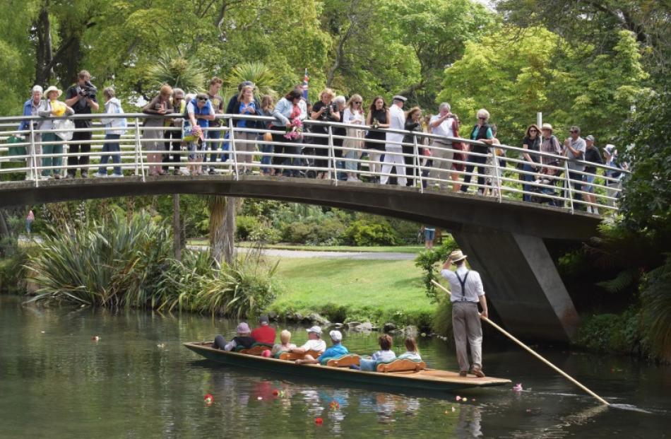 People drop flowers in the Avon River.  Photo: Getty Images