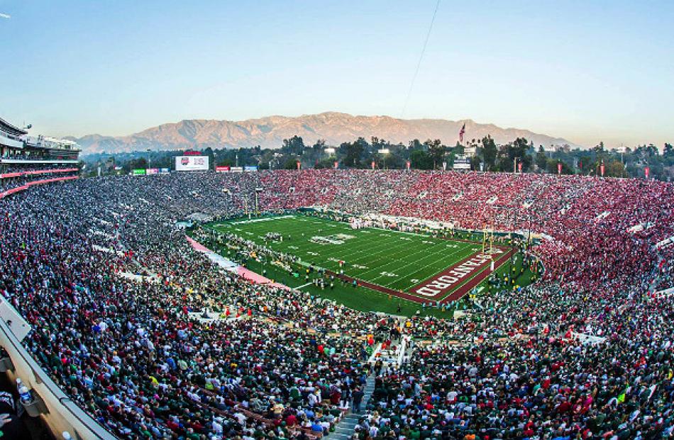 Crowds watch an NRL football game. Los Angeles is set to welcome its own team, the Rams, back to...