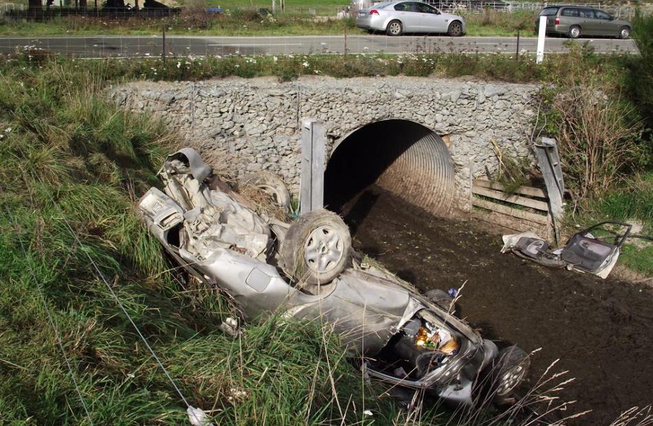 Mitchell Clarke’s Mazda 626 car, which left SH83 and crashed into a stock underpass east of the...