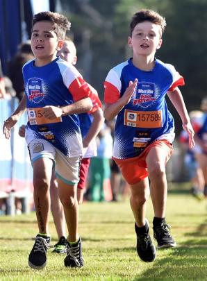 Jack Wilson (9) and Jesse Glover (9), both of Dunedin, race for the line  at Memorial Park, Mosgiel.