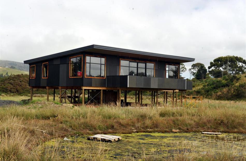 The house sits 3.7m above sea level and and has subtle changes in paint colour to maximise the...