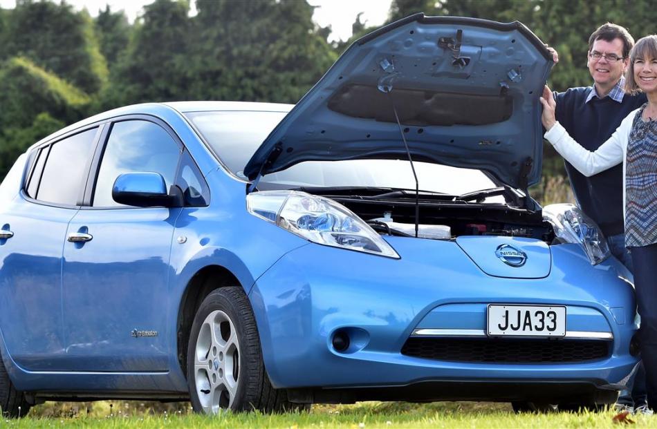 Peter Davidson and Kirsten Coppell, of Dunedin, with their Nissan Leaf electric car. Photo by...