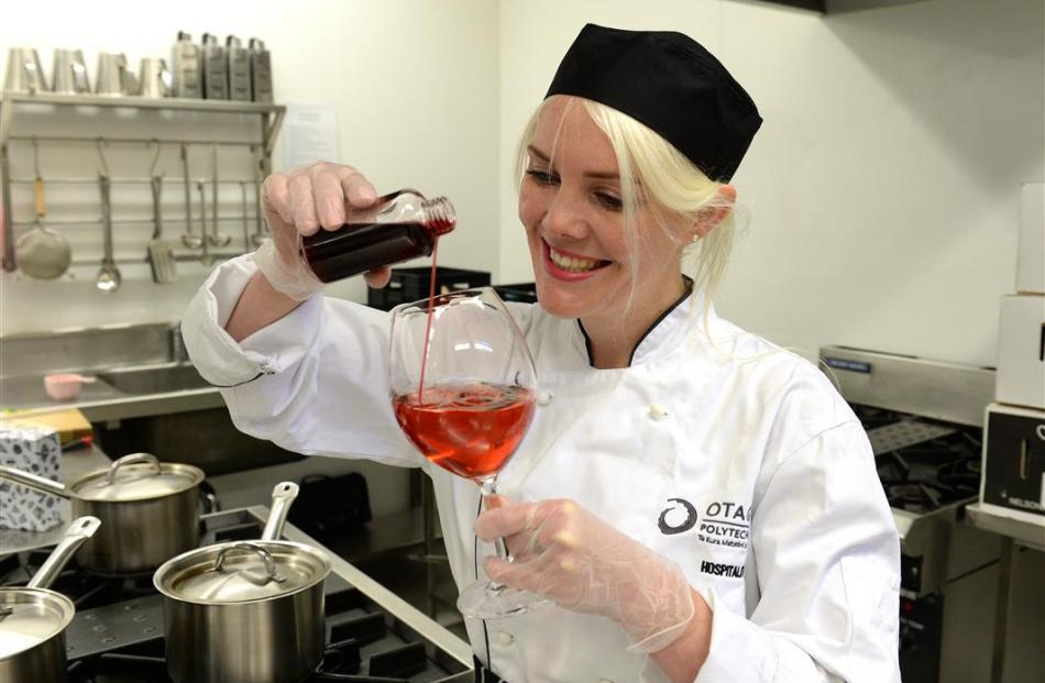 Penelope Baldwin tests  one of her botanical cordials in the test kitchen at Otago Polytechnic....