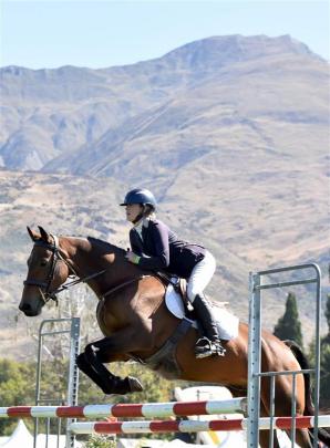 In the main ring, with a clear round, 17-year-old Maddy Thompson, of Darfield, riding Obama, led...