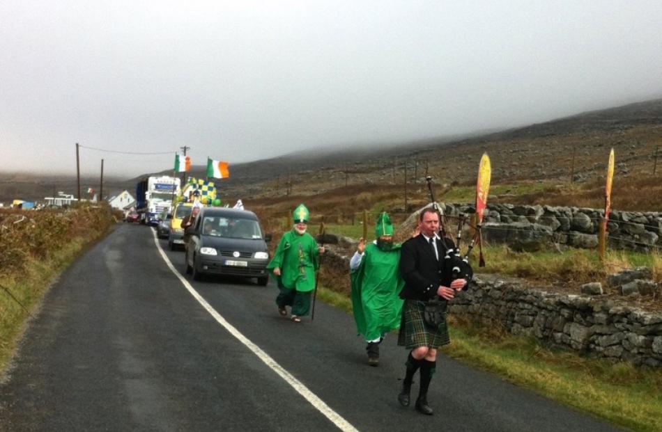 A bagpiper leads the St Patrick's Day parade in County Clare, Ireland. Photo: Maryann Worrell