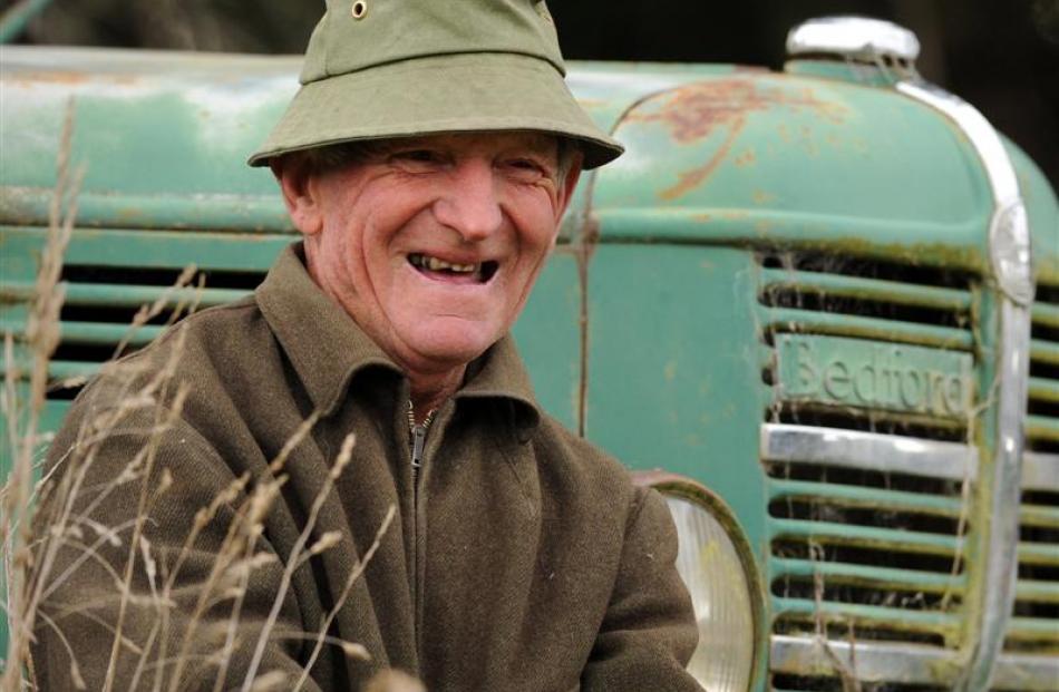John Tardif is happily reunited with an old friend, a Bedford truck he used as a night cart in...